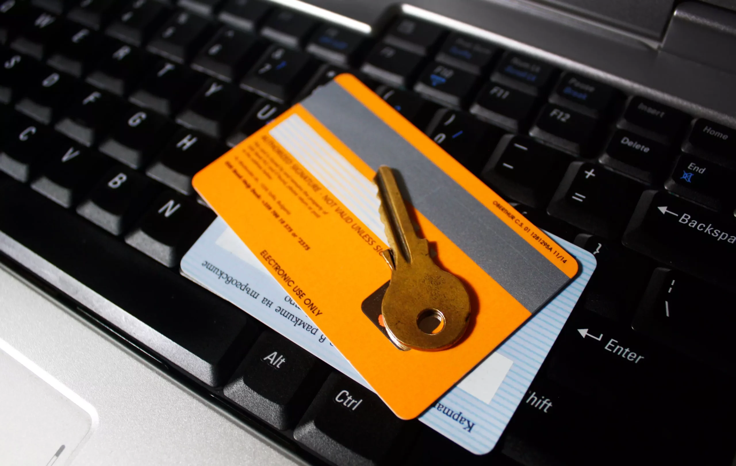Digital banking security represented by cards and a key.