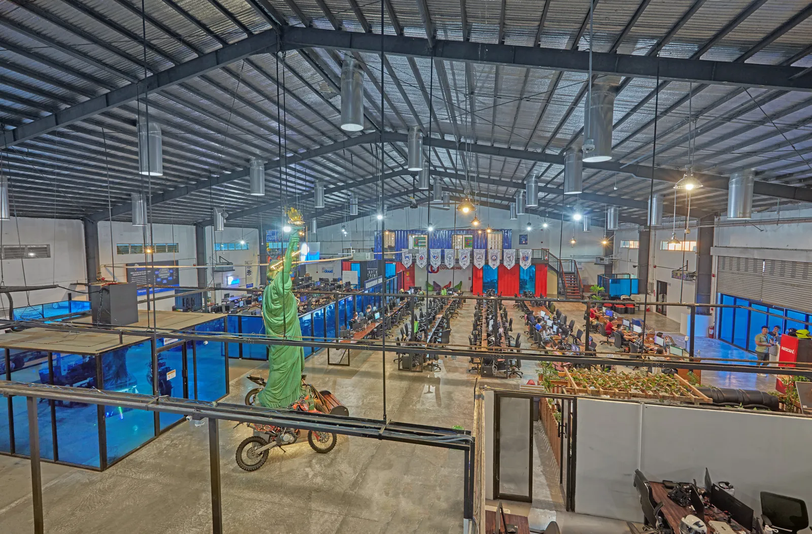 Open-plan workstations and meeting rooms in the Clark, Philippines office